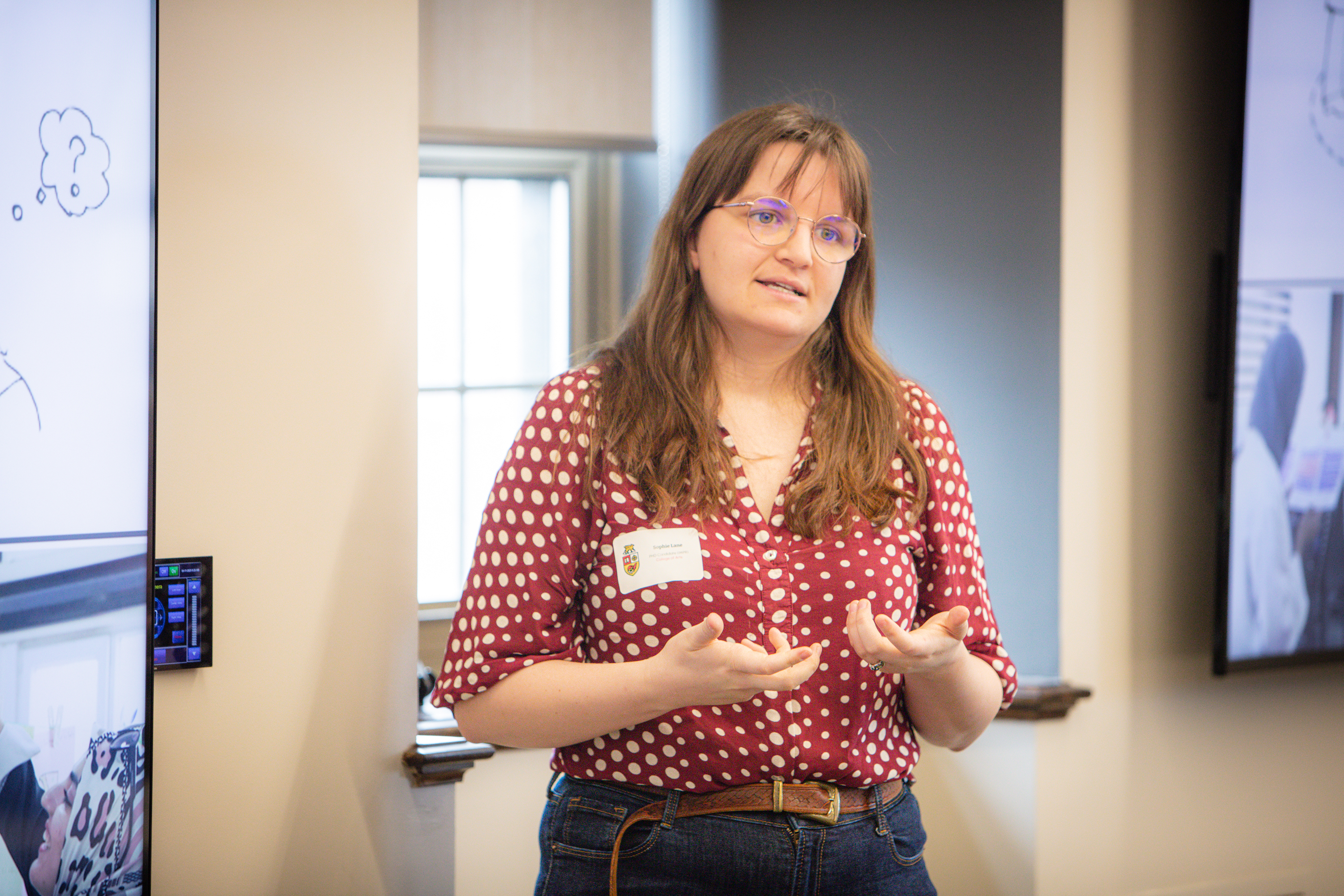 Sophie Lane, PhD candidate, College of Arts, presenting at the Three-Minute Thesis College Heat at the University of Guelph on April 11, 2025